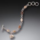 Fossilized Walrus and Mammoth Ivory Bear Charm Bracelet, Handmade Silver - <b>Zuni Bear</b>