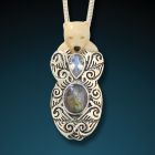 Fossilized mammoth ivory, labradorite, moonstone bear pendant - <b>Bear Hug</b>