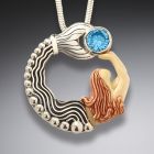 Fossilized mammoth ivory mermaid pendant with blue topaz -<b> Mermaid with Topaz</b>