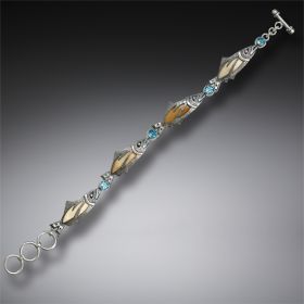 Handmade Silver Jeweled Fish Bracelet with Fossilized Walrus Ivory and Blue Topaz - <b>Treasures from the Stream</b>