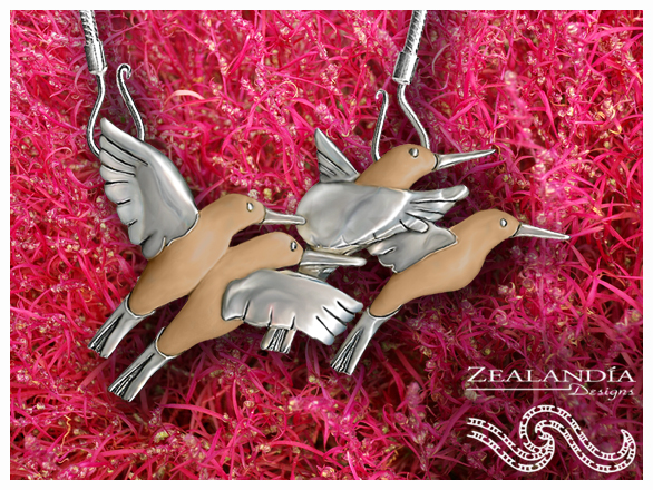 'Hummingbirds' - This hummingbird necklace in silver and fossilized ivory depicts a flight of these beloved birds on a hook chain that beautifully accents the delicacy and lines in this favorite piece